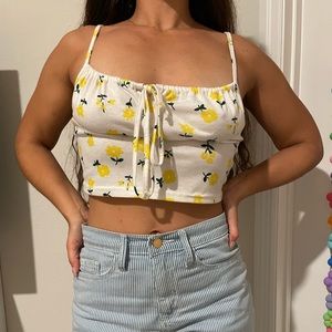 white tank with yellow flowers